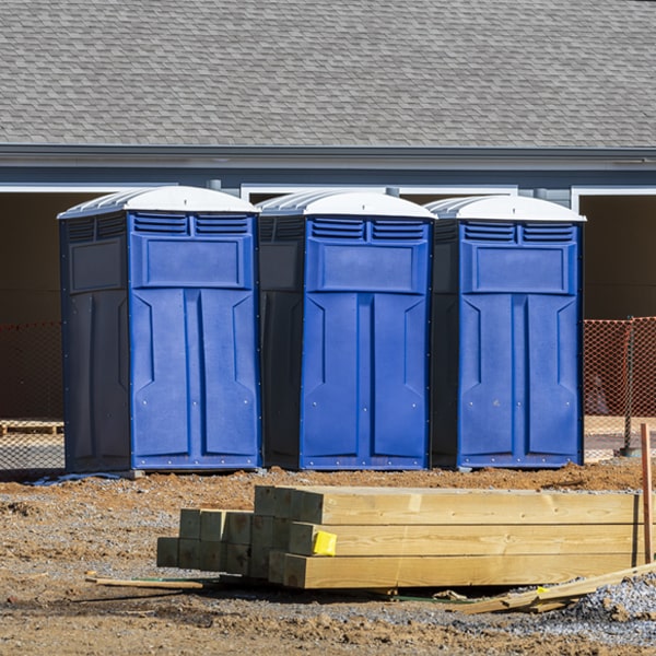 what is the cost difference between standard and deluxe porta potty rentals in Van Buren